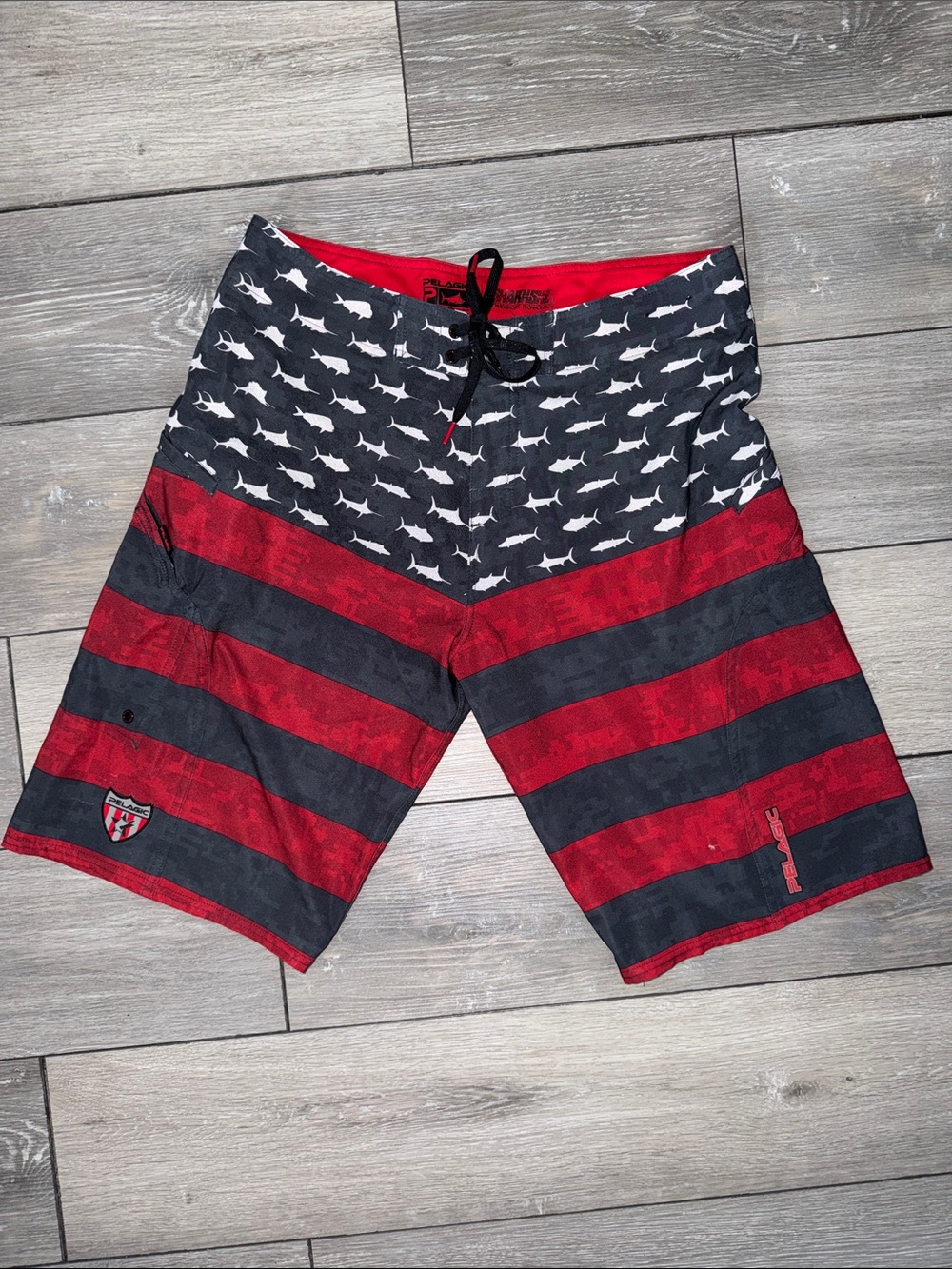 Pelagic Red and Black Shark-Print Board Shorts Men’s 34